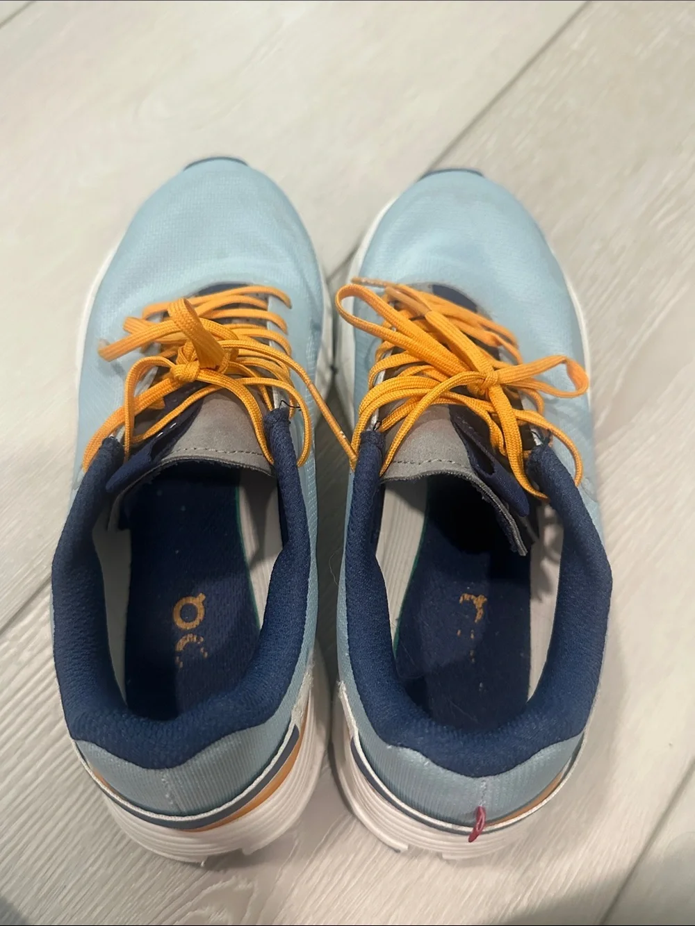 On Lightweight Women's Running Shoes in Light Blue and Orange